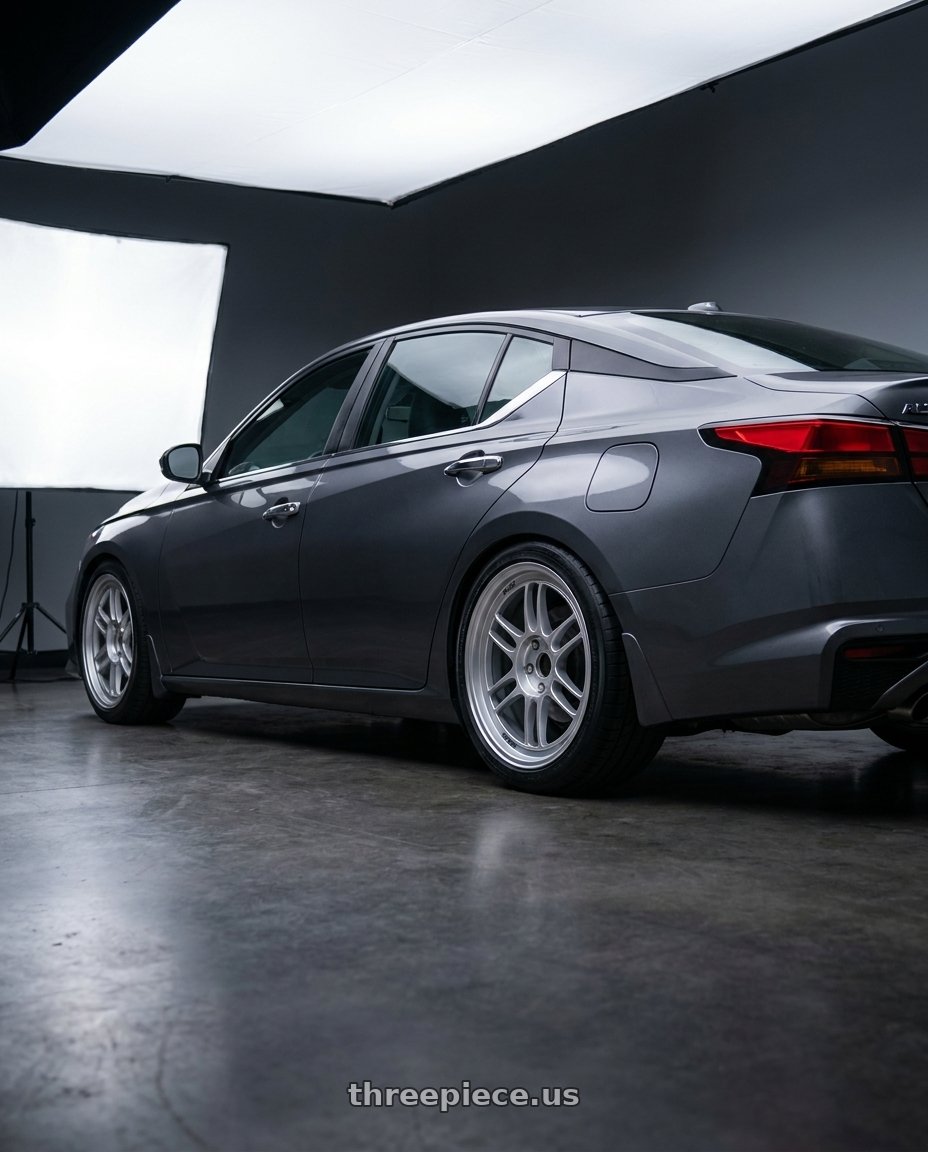 2021 Nissan Altima SV with Enkei RPF1 5x114.3 18x8+35 Silver wheels rear three quarter view square tires
