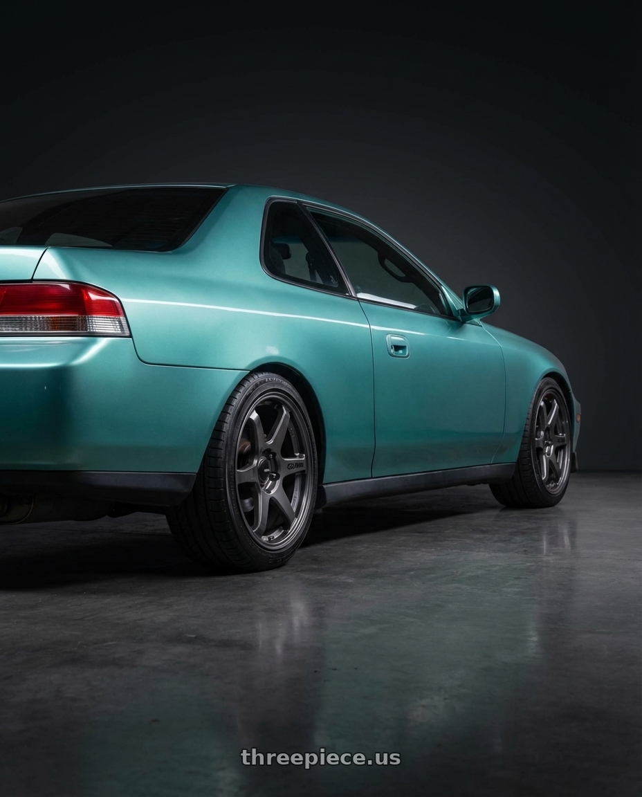 1996 Honda Prelude SI Aztec Green with Enkei T6R 5x114.3 17x8+40 Gloss Gunmetal wheels rear three quarter view square tires