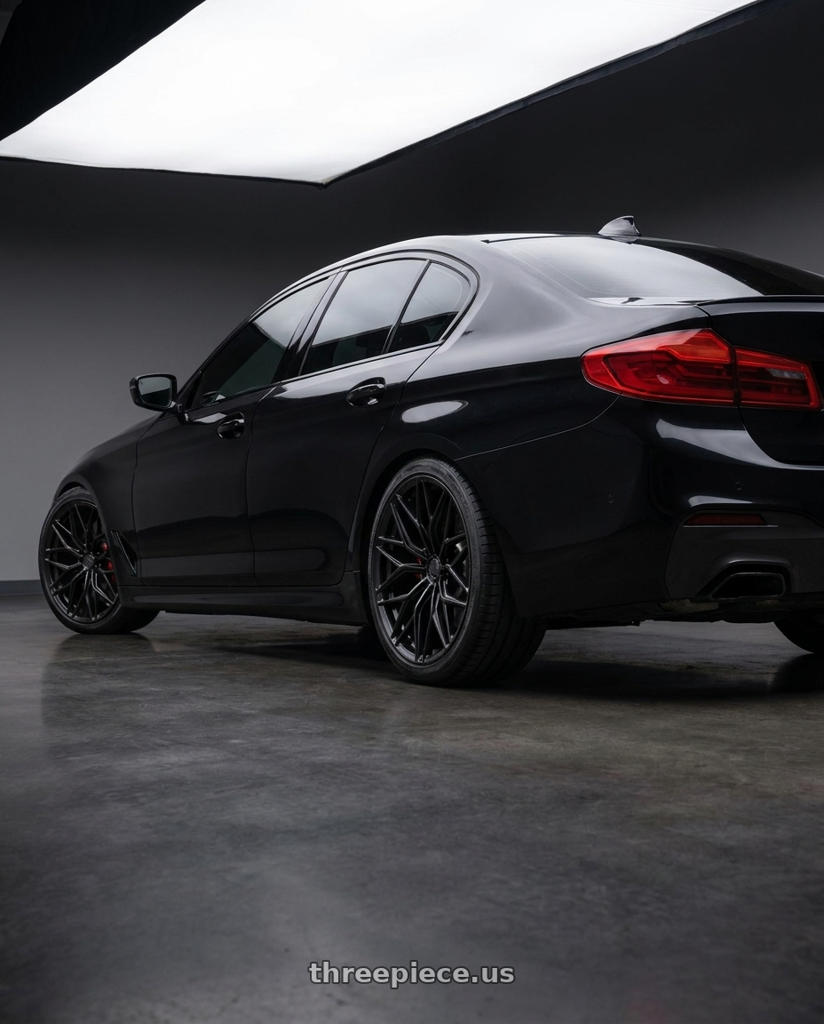 2020 bmw m550i with Brada FR80 5x112 20x10 +10 Satin Black wheels rear three quarter view square tires