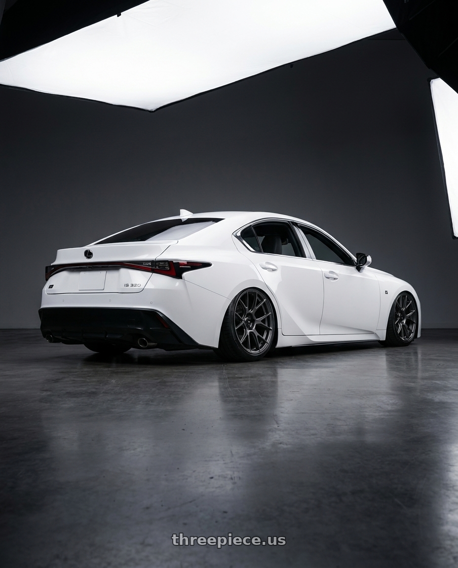 2024 Lexus IS 350 with Konig Ampliform 5x114.3 19x10.5+23 Dark Metallic Graphite wheels rear three quarter view slight stretch tires