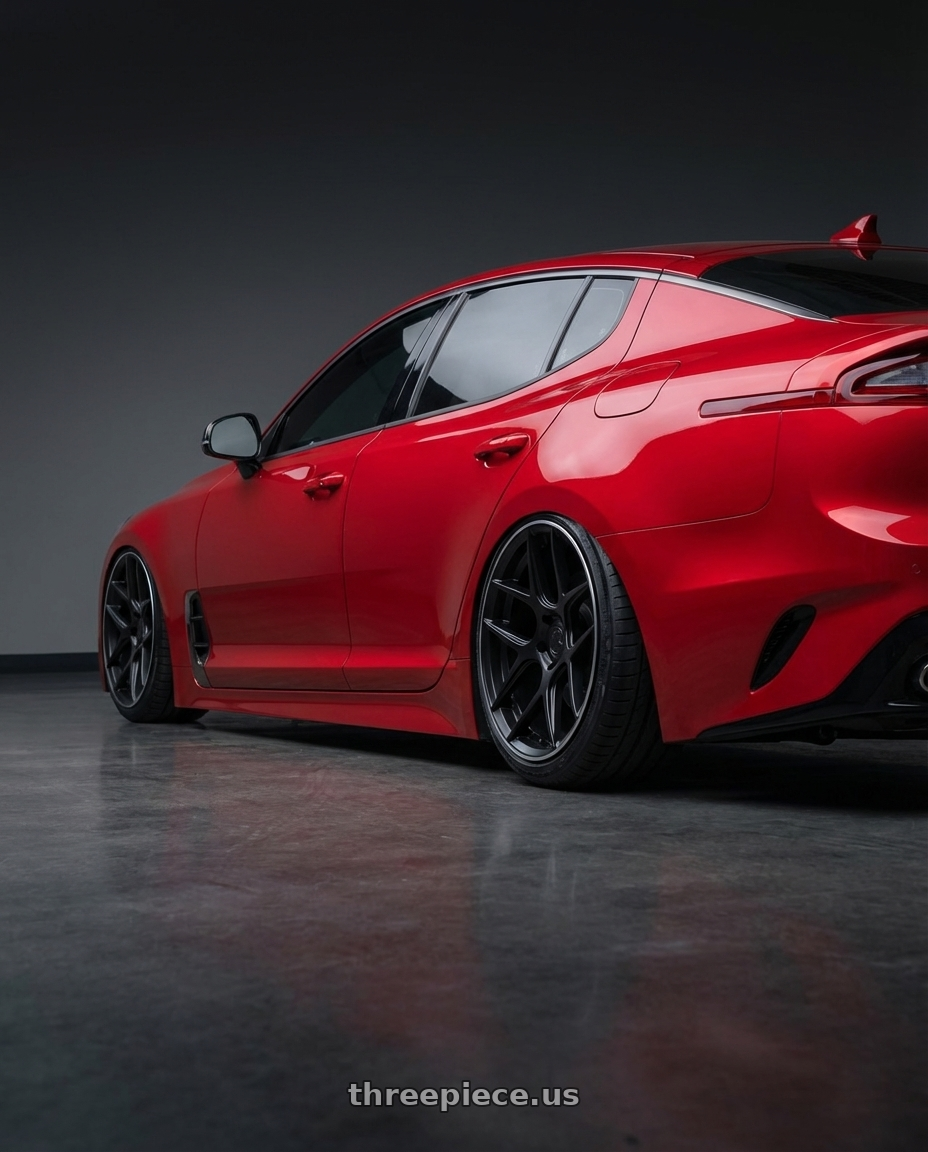 2022 Kia Stinger GT with Aodhan AFF2 5x114.3 19x9.5+35 Matte Black wheels rear three quarter view slight stretch tires