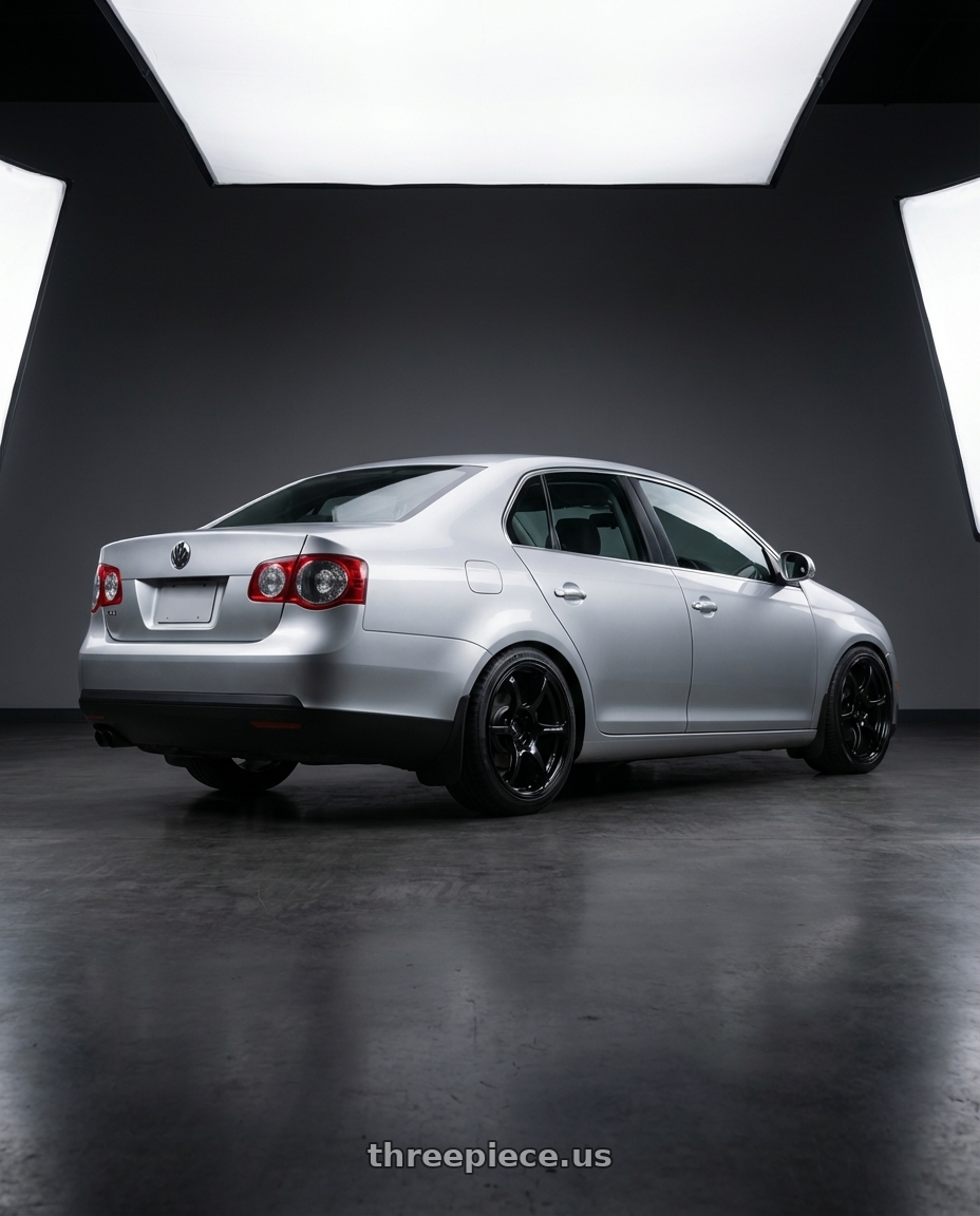 2009 Volkswagen Jetta GLI MK5 with Advan RGIII 5x112 18x8+50 Gloss Black wheels rear three quarter view square tires