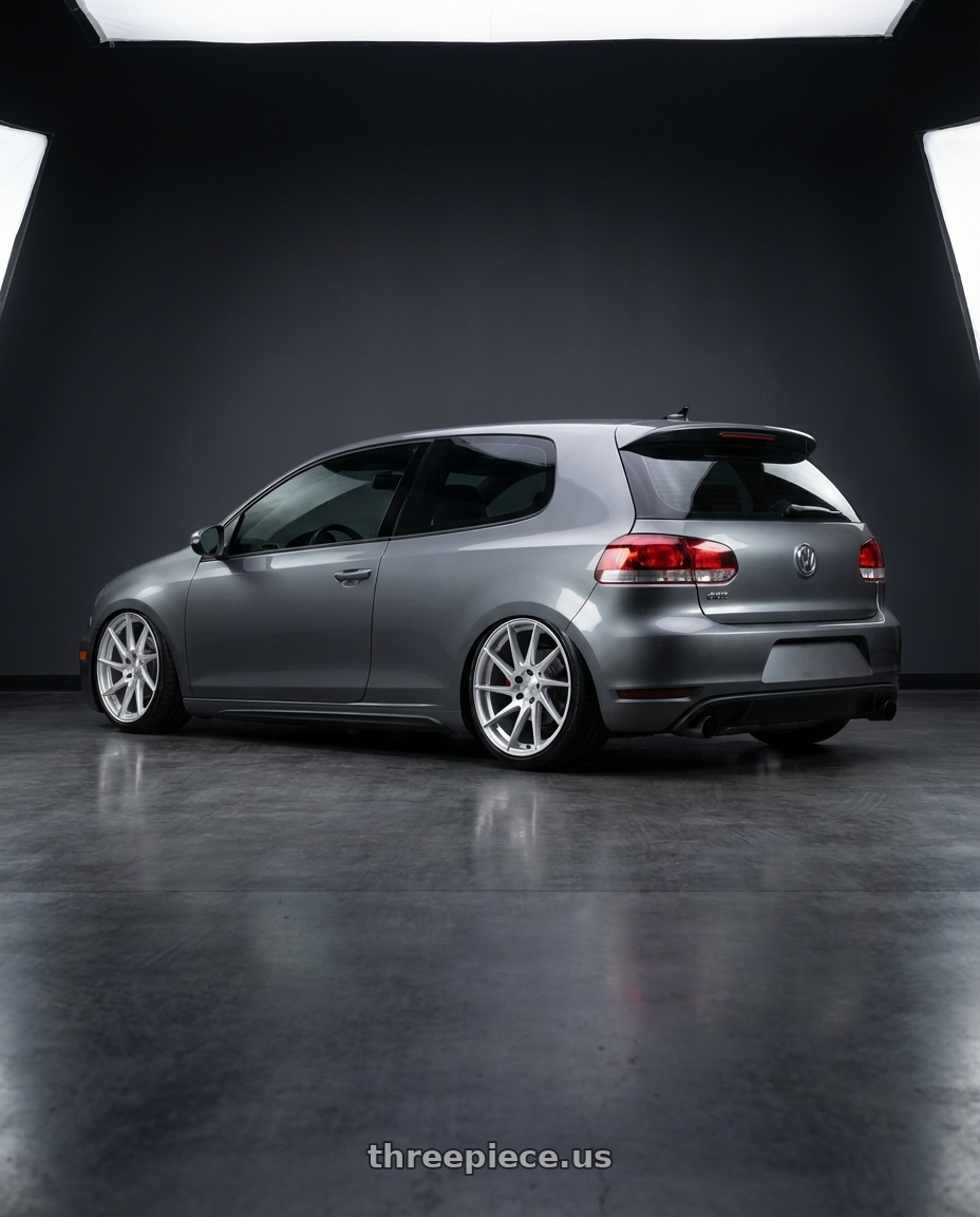 2013 Volkswagen GTI MK6 with Aodhan AH09 5x112 18x9.5 +35 Gloss Silver Machined Face wheels rear three quarter view slight stretch tires