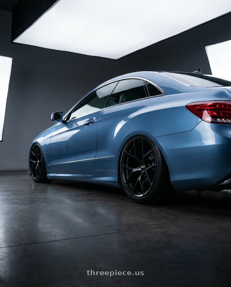 2014 Mercedes-Benz E-Class Coupe C207 with BBS FI-R Evo 5x112 19x9.5+15 Satin Black wheels rear three quarter view slight stretch tires