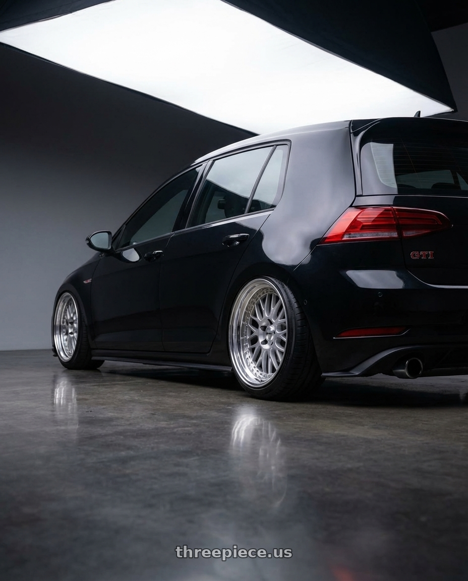 2021 Volkswagen Gti S Black with Work Meister M1 3p 4x100 16x10.5+13 W Disk Silver wheels rear three quarter view extreme stretch tires