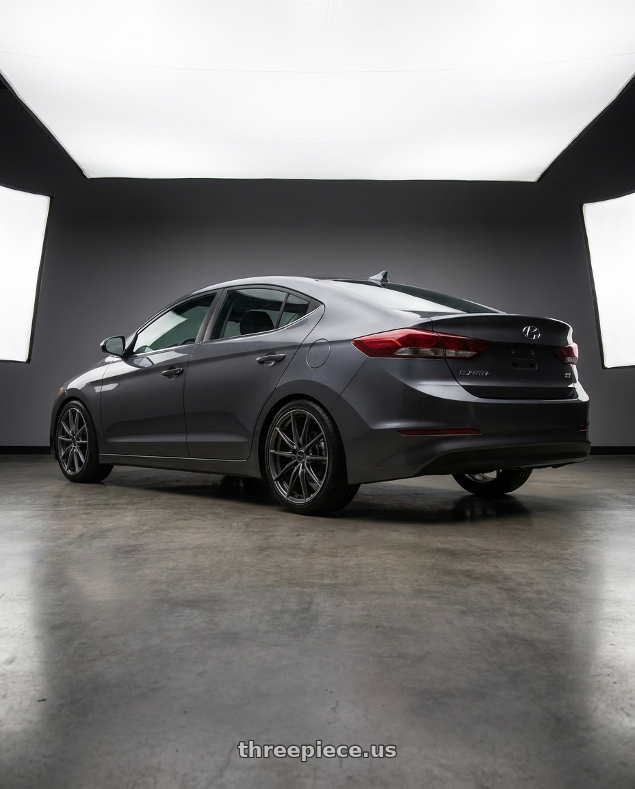 2017 Super Elantra with Enkei DRACO 5x120 18x8.0+35 Anthracite wheels rear three quarter view square tires