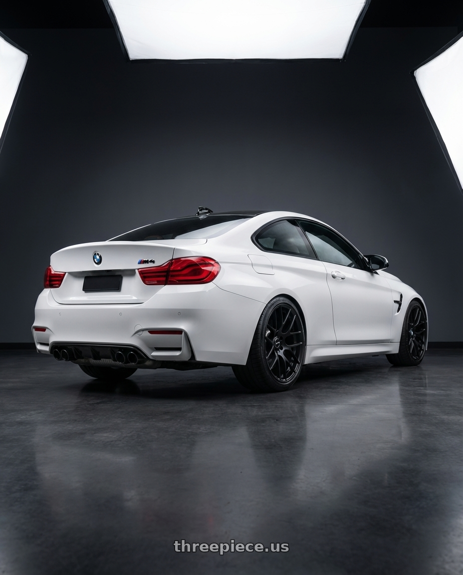 2018 BMW M4 F82 with Avant Garde Wheels M359 5X120 19x10 +25 Matte Black wheels rear three quarter view square tires