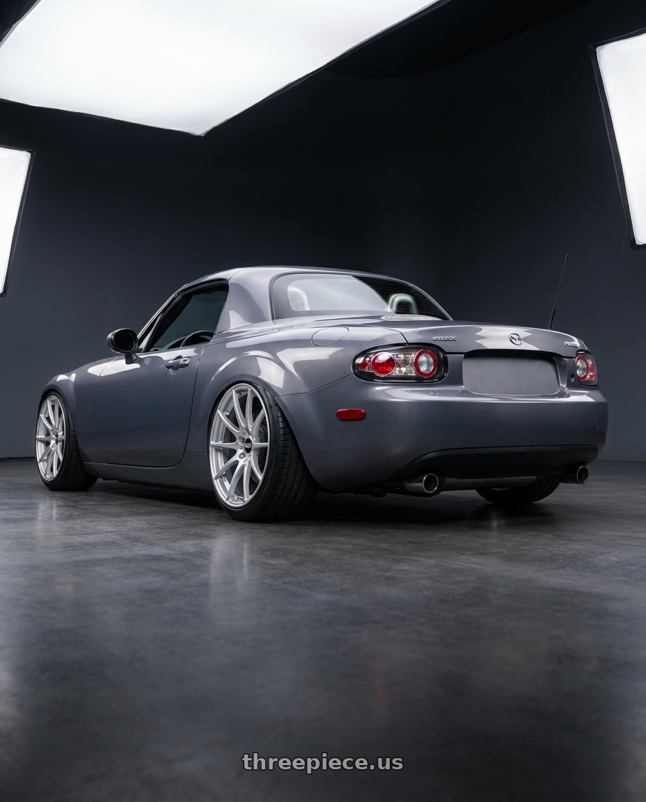 2007 Mazda Miata with BBS FS 5x112 19x10 +38 PFS Diamond Silver wheels rear three quarter view extreme stretch tires