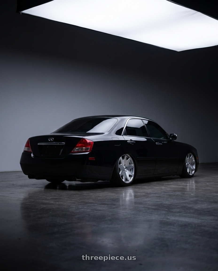 2003 Infiniti M45 Black with MRR HR3 5x114.3 20x8.5  +35 Silver Machine Face wheels rear three quarter view slight stretch tires