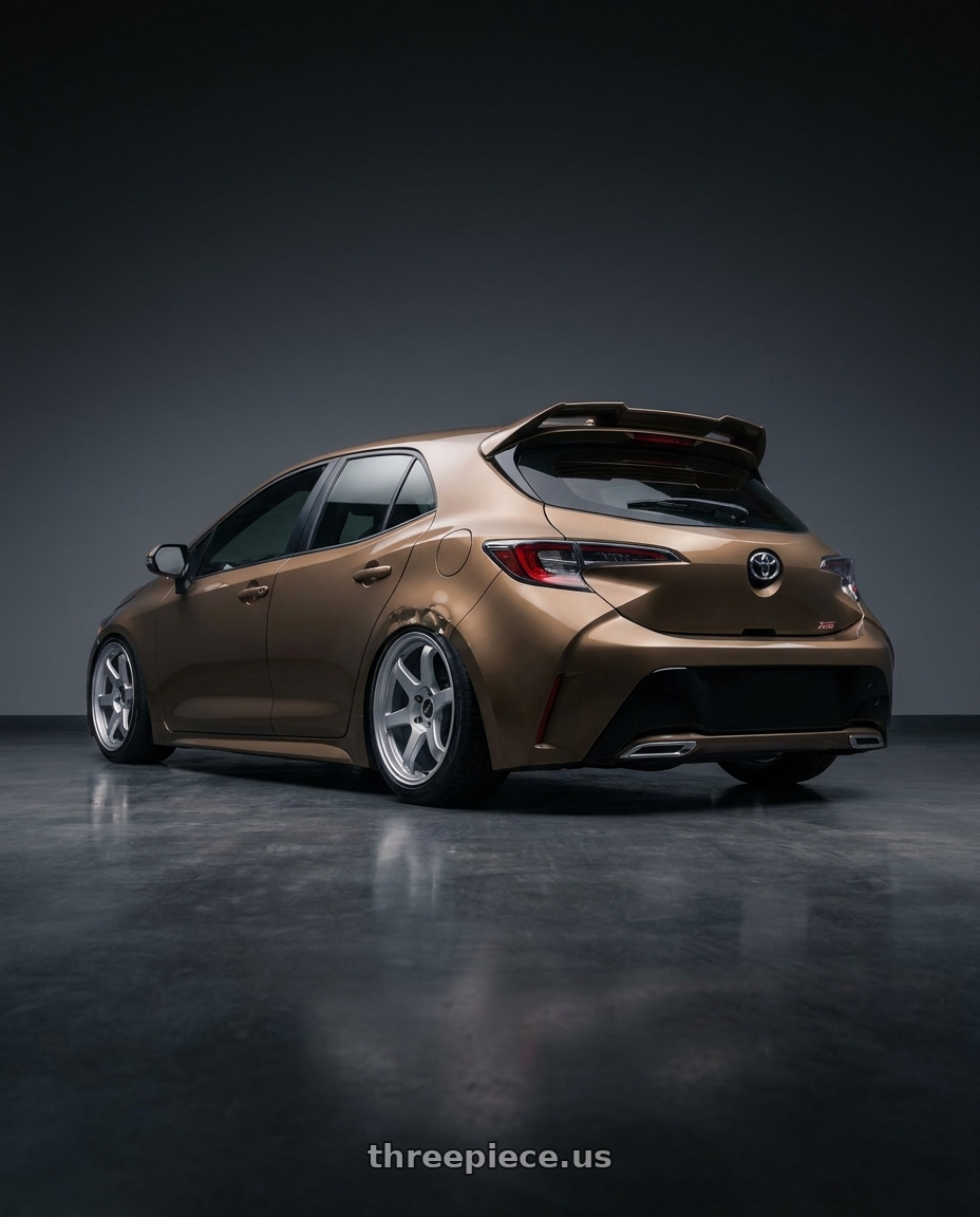 2019 Corolla hatch xse oxidize bronze with spoiler with Enkei T6S 5x100 17x8+45 Matte Silver wheels rear three quarter view slight stretch tires