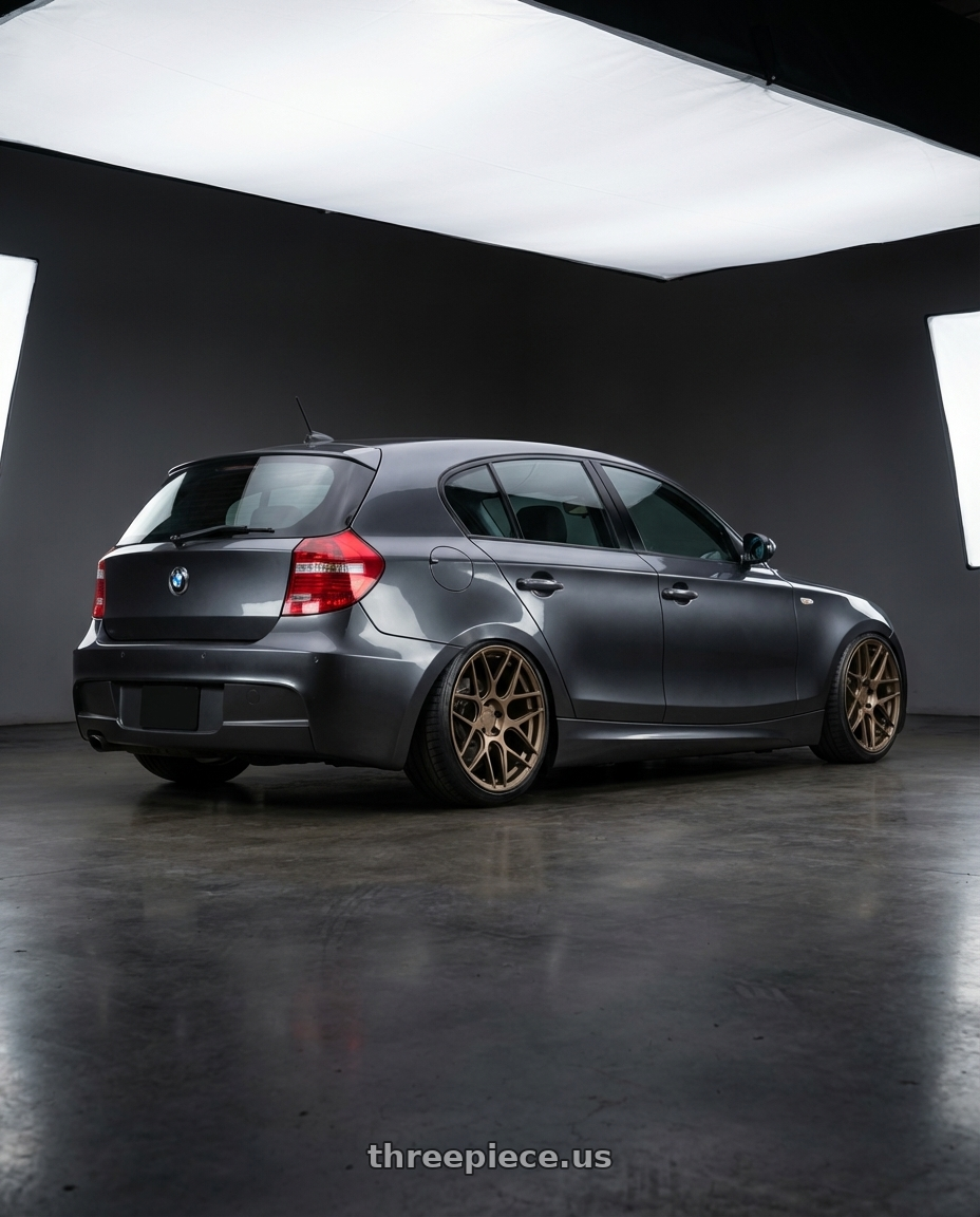 2012 BMW 1 Series E82 with Aodhan AFF2 5x120 19x8.5+35 Matte Bronze wheels rear three quarter view slight stretch tires