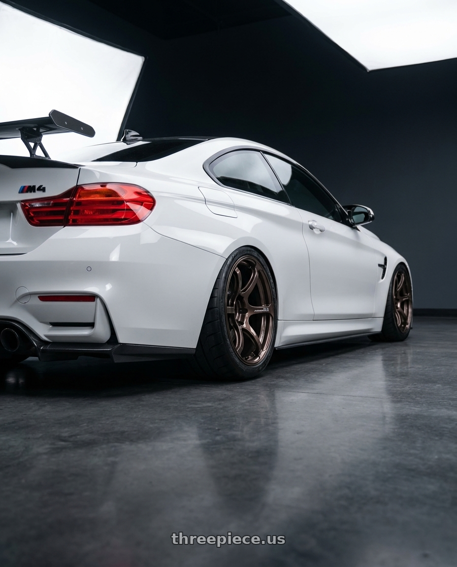 2016 BMW F82 M4 with Advan Racing RG-4 5x114.3 18x9.5 +45 RACING COPPER BRONZE wheels rear three quarter view meaty tires