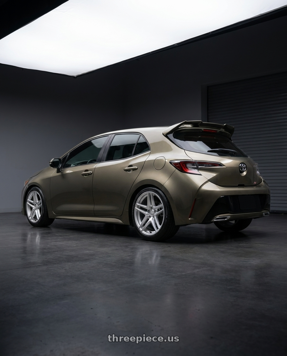 2019 Corolla hatch se oxidize bronze with spoiler with Kansei K15H Astro 5X100 18x9 22 Hyper Silver wheels rear three quarter view square tires