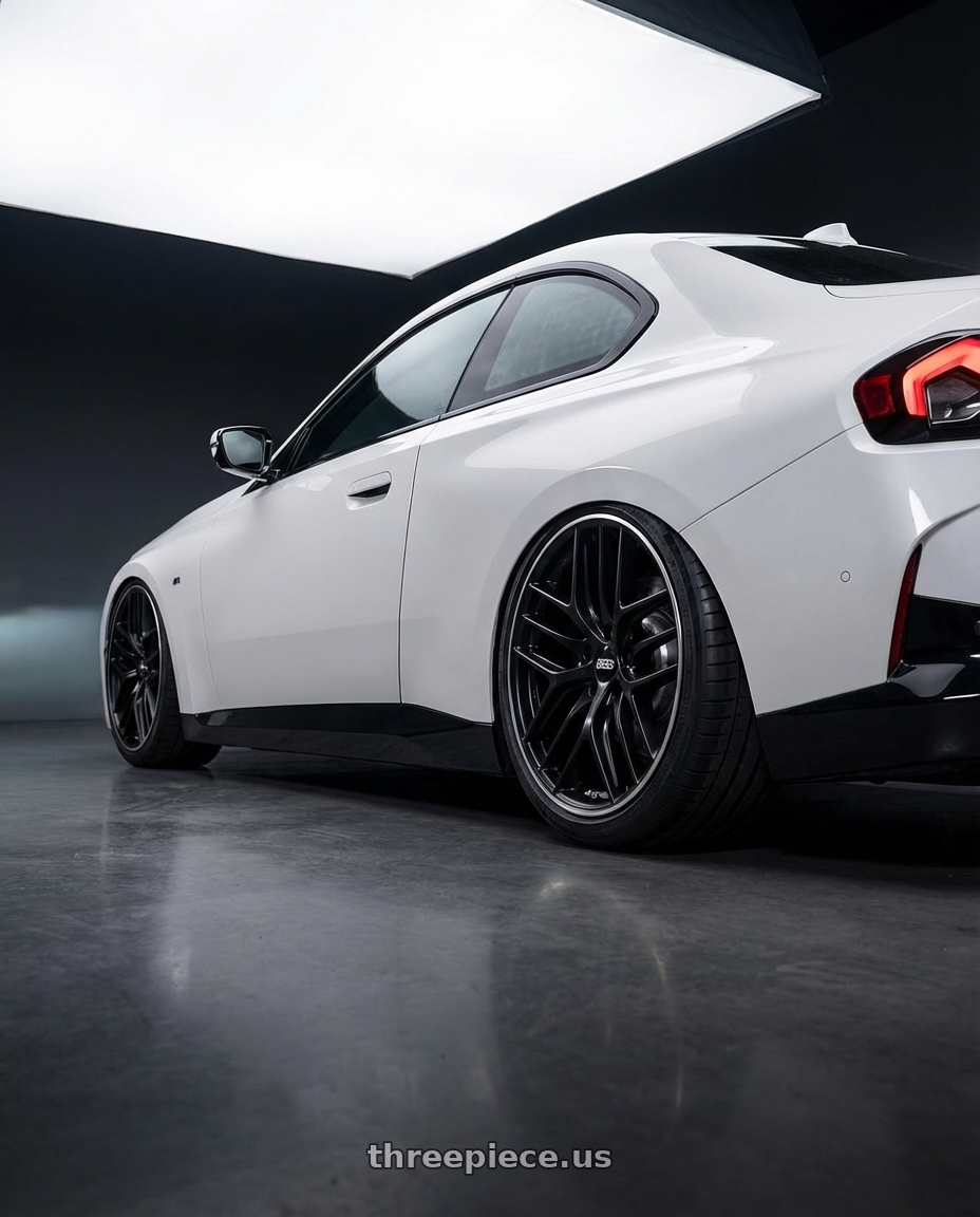 2024 BMW 2 Series G42 with BBS CC-R 5x112 19x9.5+42 Satin Black wheels rear three quarter view slight stretch tires