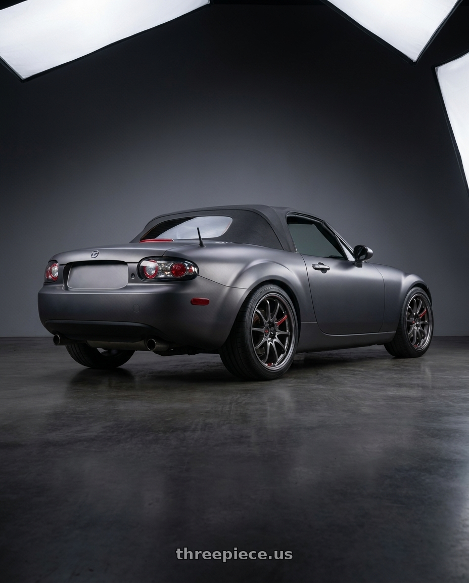 2007 Mazda Miata MX-5 with Volk Racing CE28N-PLUS SL 5x114.3 17x7.5+43 Pressed Graphite wheels rear three quarter view square tires