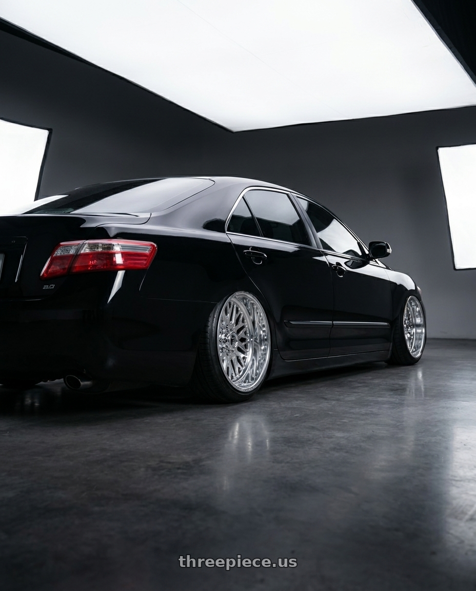 2008 Toyota Camry 2.0 E with Fuel Forged FF109 8x165.1 20x9 +0 POLISHED wheels rear three quarter view slight stretch tires