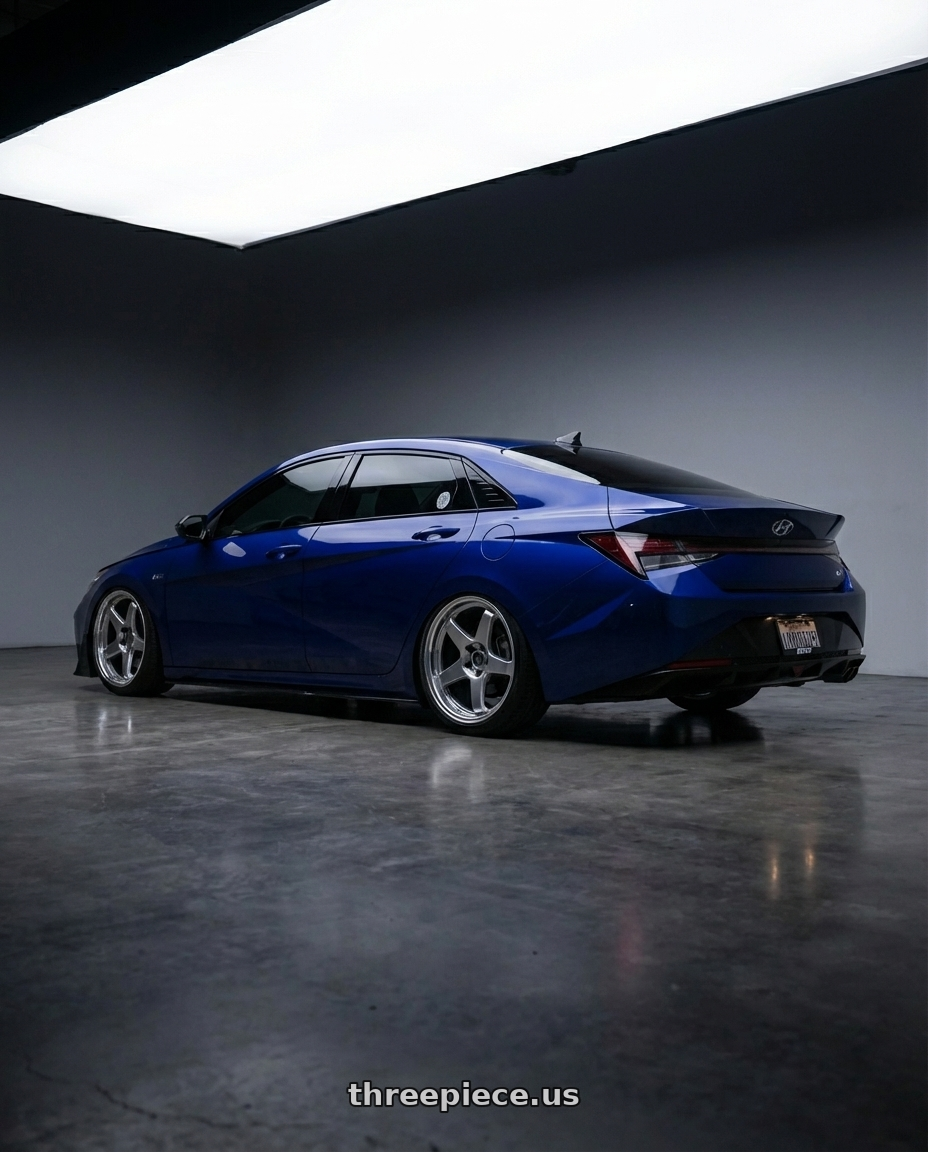 2025 Elantra N Line with Kansei K12H KNP 5X100 17x9 35 Hyper Silver wheels rear three quarter view square tires