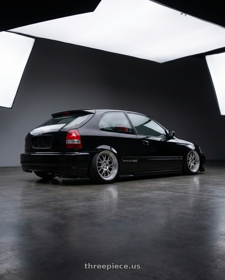2000 honda civic hatchback with SSR Professor MS3R 4X100 16X7 26 NR Disk Titan Silver wheels rear three quarter view slight stretch tires