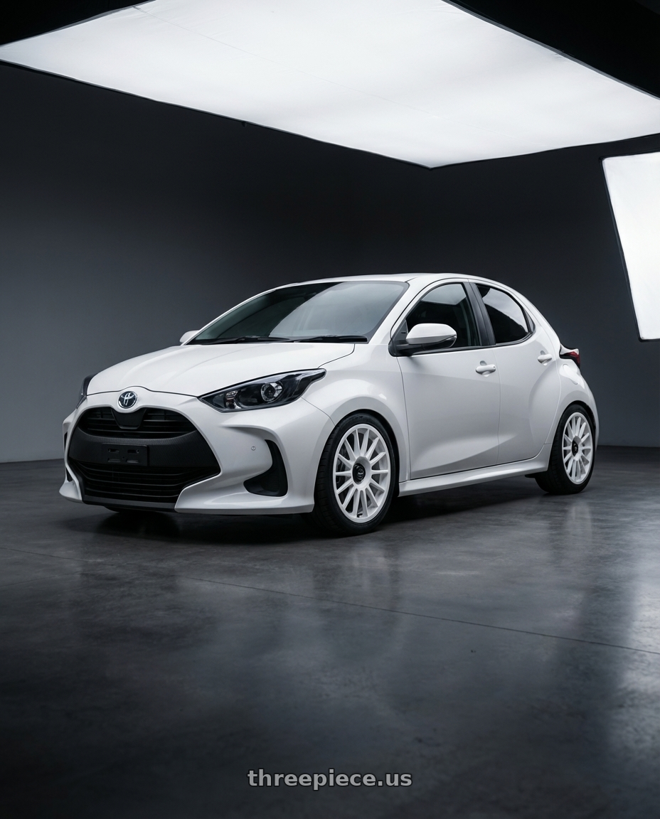 2021 Toyota Yaris  with fifteen52 PODIUM 5x112 / 5x120 18x8.5 +35 RALLY WHITE (GLOSS WHITE) wheels