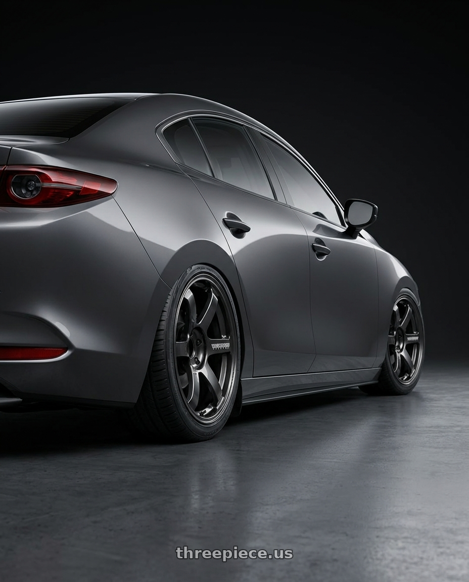 2024 Mazda3 Sedan with Volk Racing TE37 Saga S-Plus 5x114.3 18x8.5+42 Diamond Dark Gunmetal wheels rear three quarter view square tires