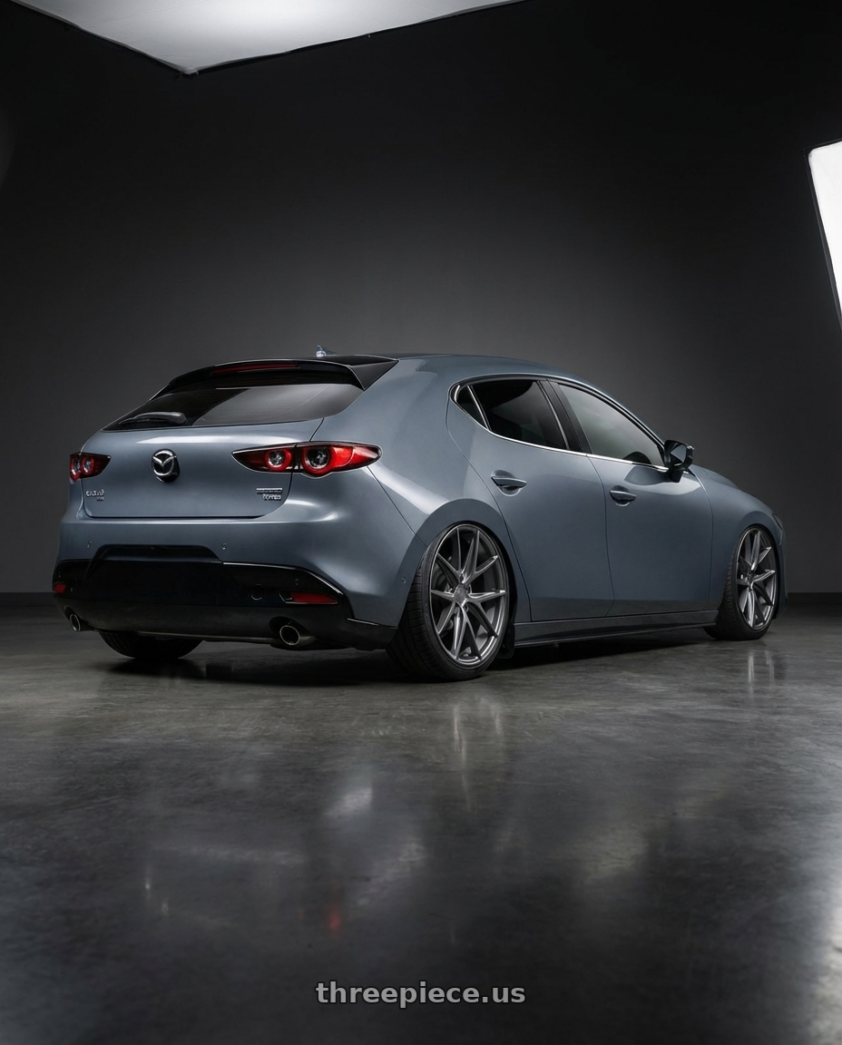 2023 Mazda Mazda3 Turbo with Niche 1PC M116 MISANO 5X114.3 18X8 +40 MATTE GUN METAL wheels rear three quarter view slight stretch tires
