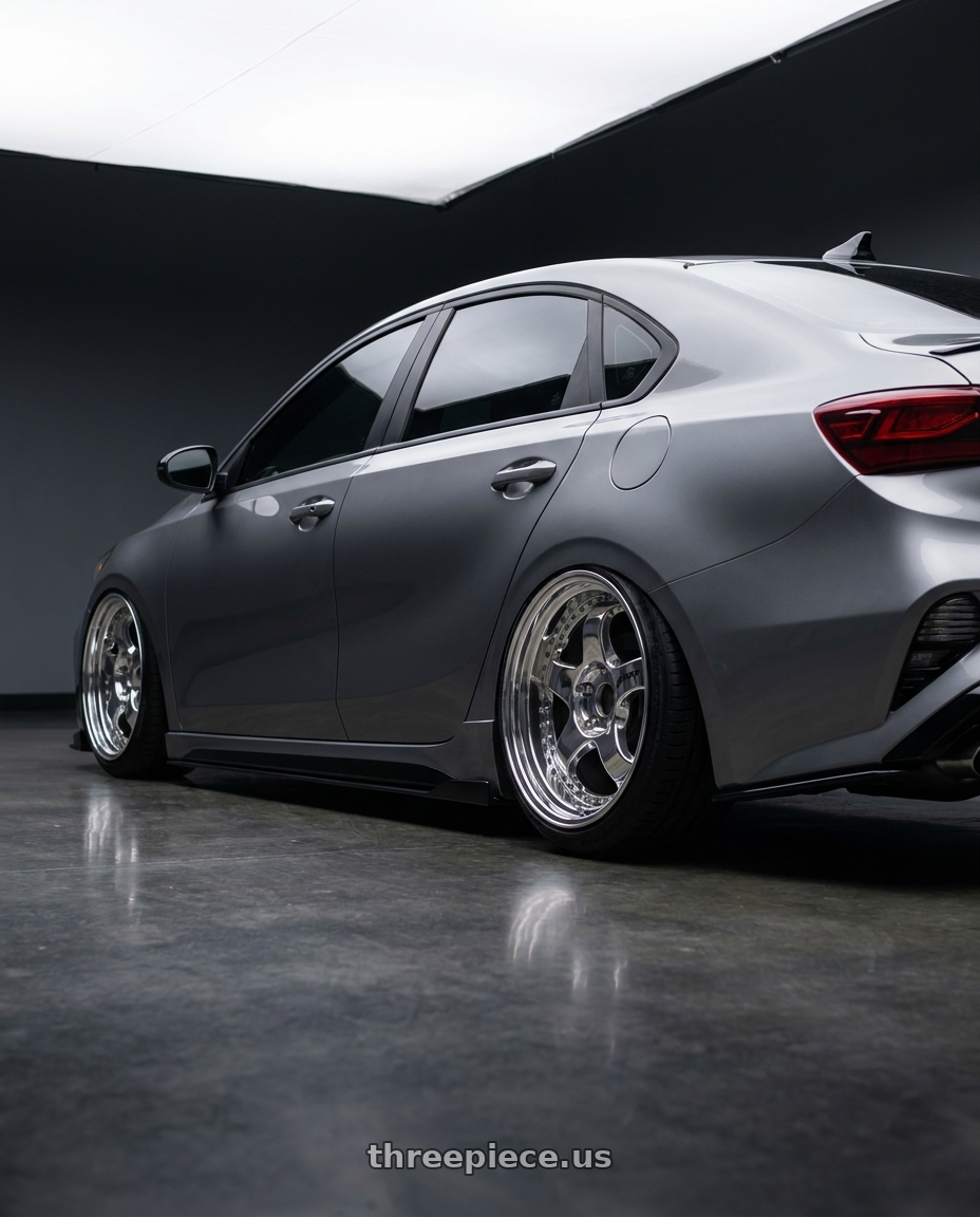 2022 kia forte gt with Work Meister S1 3P wheels rear three quarter view slight stretch tires