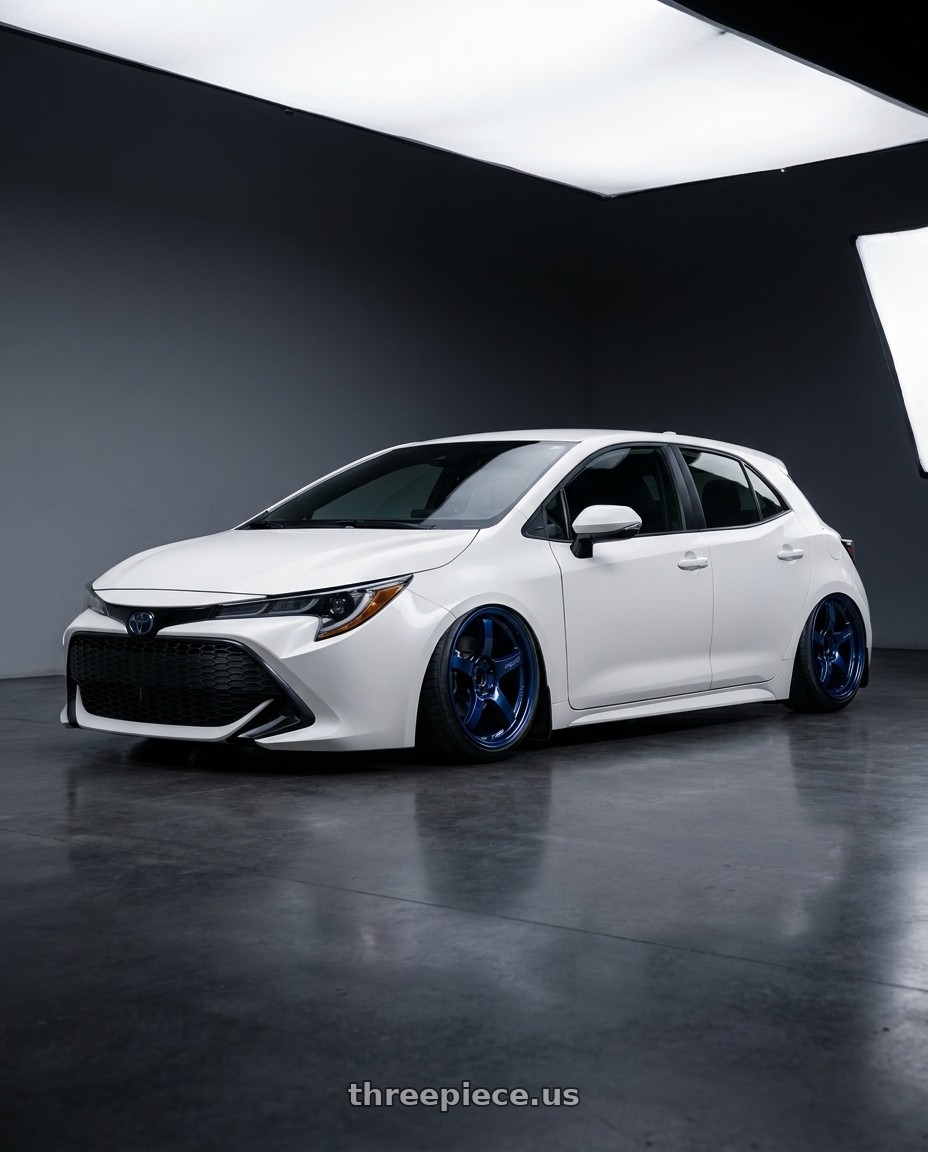 2023 Toyota Corolla Hatchback with Gram Lights 57CR 5x114.3 18x9.5+12 Eternal Blue Pearl wheels