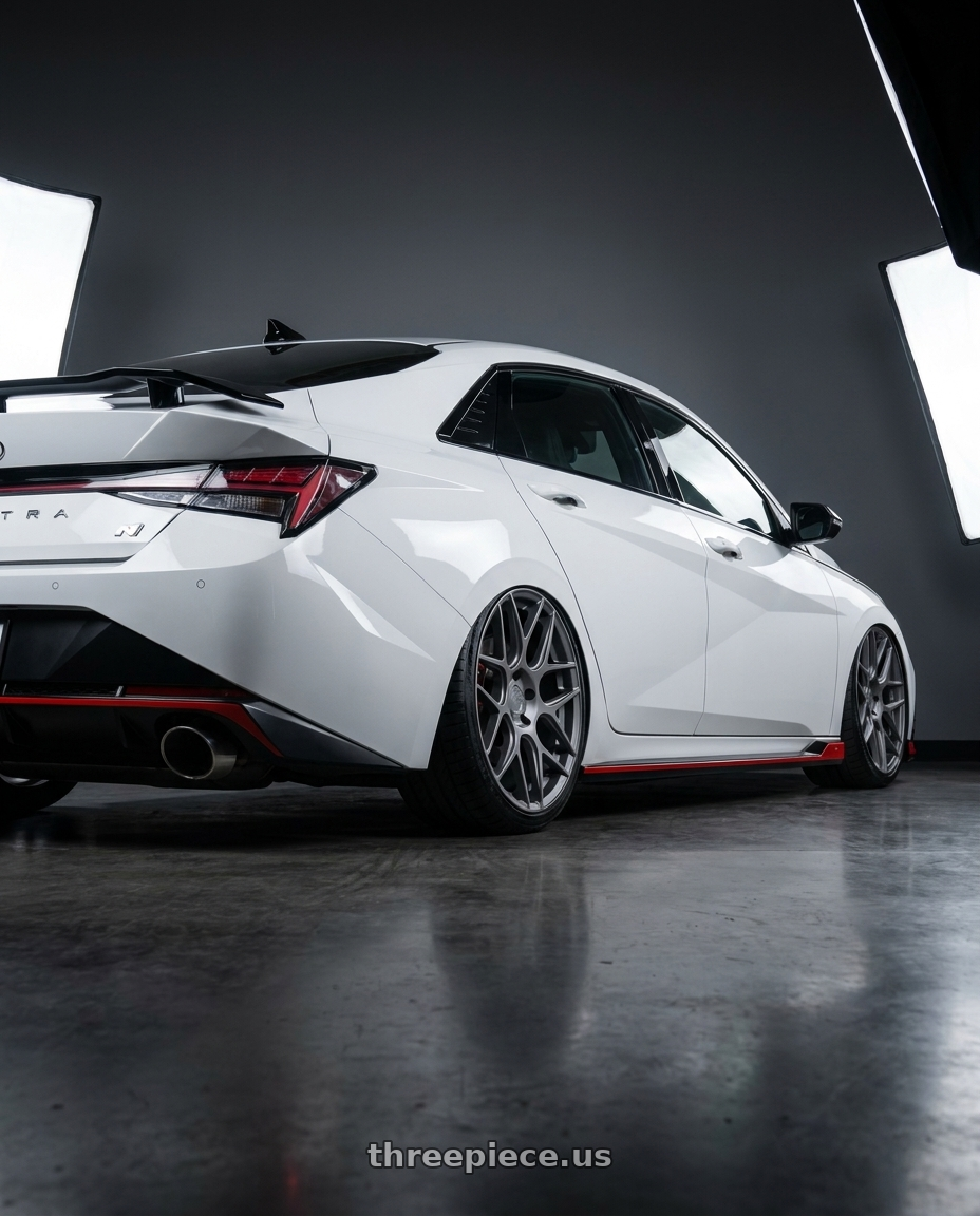 2024 Hyundai Elantra N with Aodhan AFF2 5x114.3 19x8.5+35 Matte Gray wheels rear three quarter view slight stretch tires