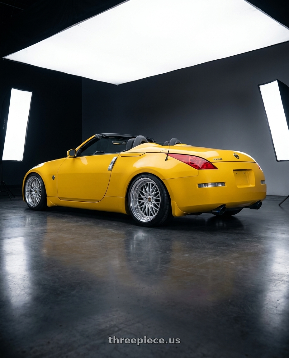2005 Nissan 350z with Work Vs-Xv 5x120 19x11.5-24 R Disk Silky Rich Silver wheels rear three quarter view square tires