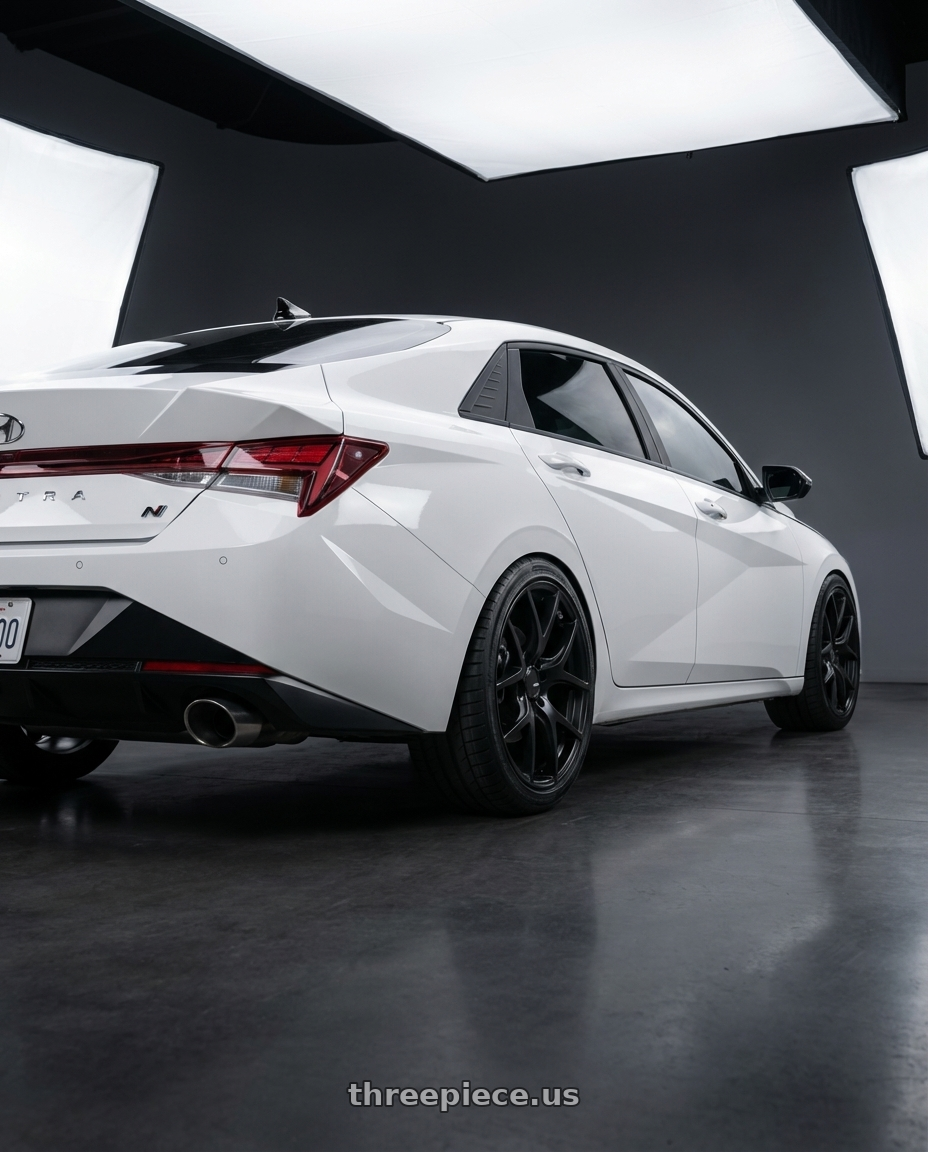 2024 Hyundai Elantra N with Ssr Gtv03 5x114.3 19x8.5+38  FLAT BLACK wheels rear three quarter view square tires