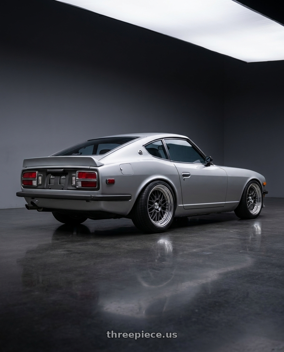 1974 260z datsun with Work Meister M1 3p 4x114.3 16x8+5 O Disk Matte Gunmetal wheels rear three quarter view square tires