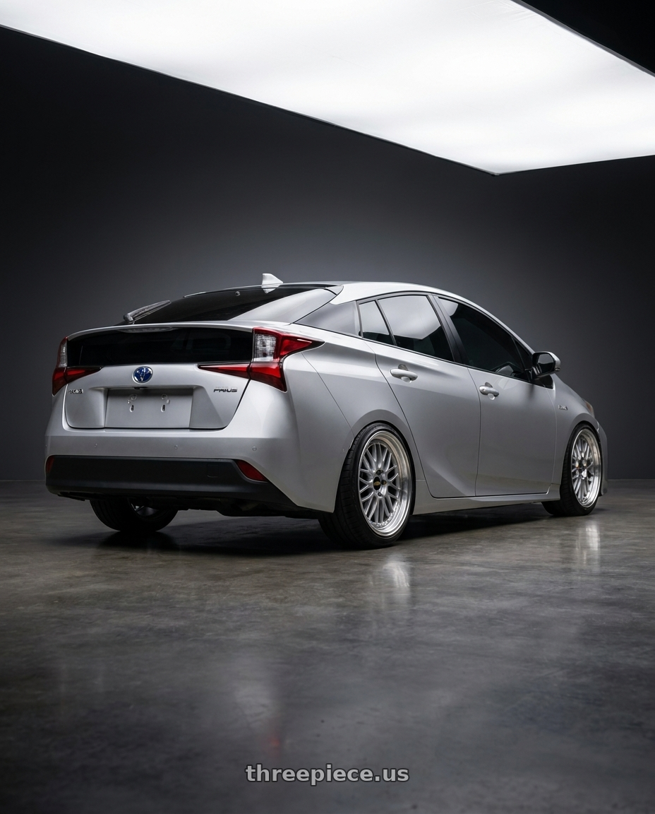 2019 Toyota Prius 4X1 with BBS LM 5x114.3 18x10.0+20 Diamond Silver wheels rear three quarter view slight stretch tires