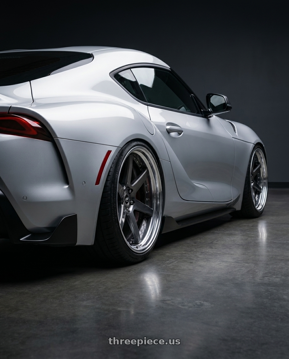 2020 gr supra premium  with Work Zeast Black Label Bst1 5x112 20x11+12 R Disk Brilliant Silver Black wheels rear three quarter view square tires