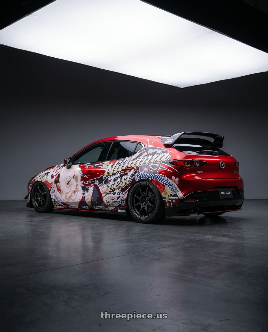 2026 mazda 3 with Volk Racing CE28 Club Racer 5x114.3 16x7+42 wheels rear three quarter view square tires