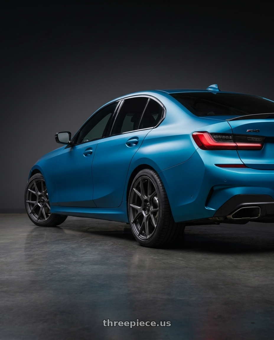 2023 bmw m340i xdrive with Konig Ampliform 5x112 19x8.5+32 Dark Metallic Graphite wheels rear three quarter view square tires