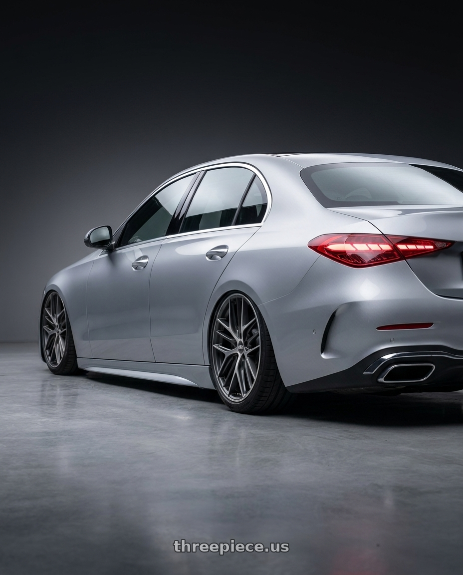 2022 Mercedes-Benz C-Class W206 with BBS CC-R 5x112 19x9.0+42 Graphite w/ Diamond Cut Face wheels rear three quarter view slight stretch tires