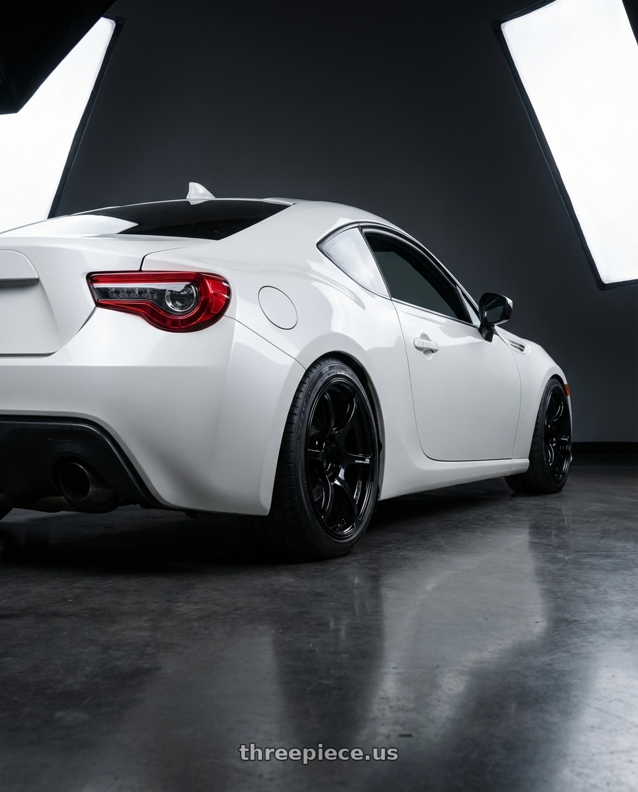 2016 Scion FR-S with Advan RGIII 5x100 17x7.5+50 Gloss Black wheels rear three quarter view square tires