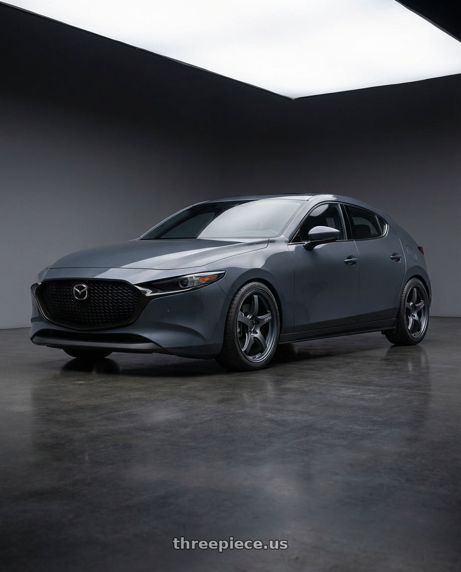 2023 Mazda Mazda3 Turbo with Gram Lights 57CR 5x114.3 18x9.5+12 Gunblue II wheels front three quarter view lowered stance