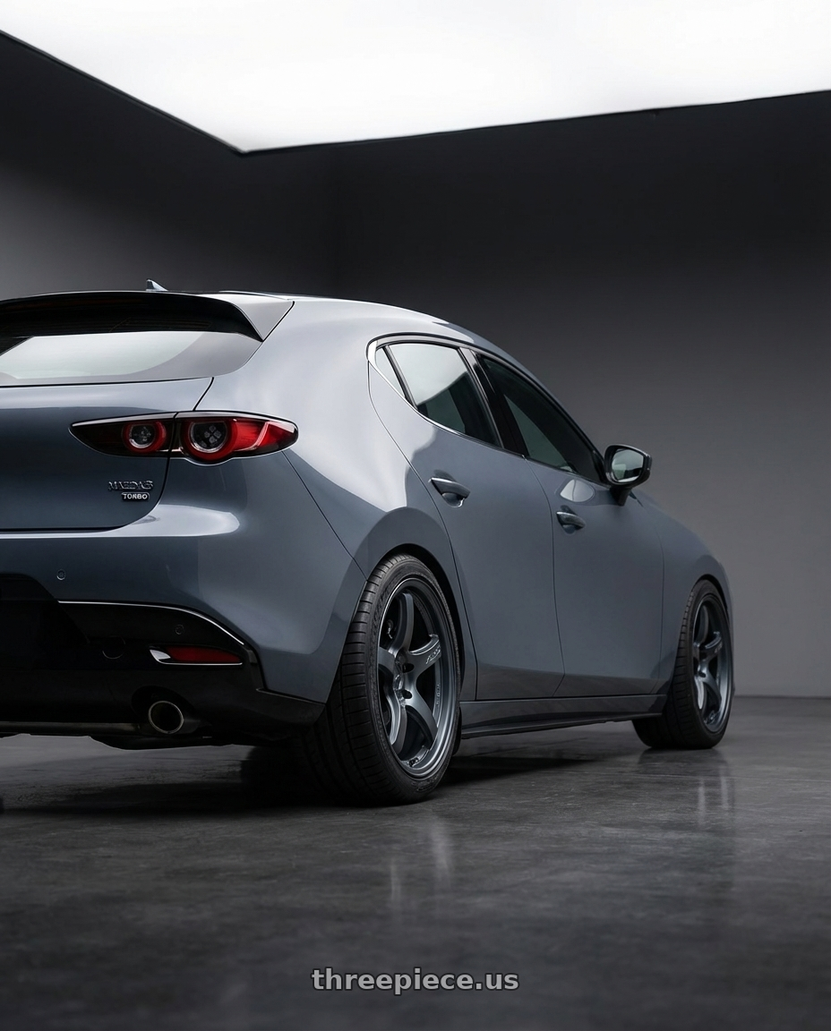 2023 Mazda Mazda3 Turbo with Gram Lights 57CR 5x114.3 18x9.5+12 Gunblue II wheels rear three quarter view square tires