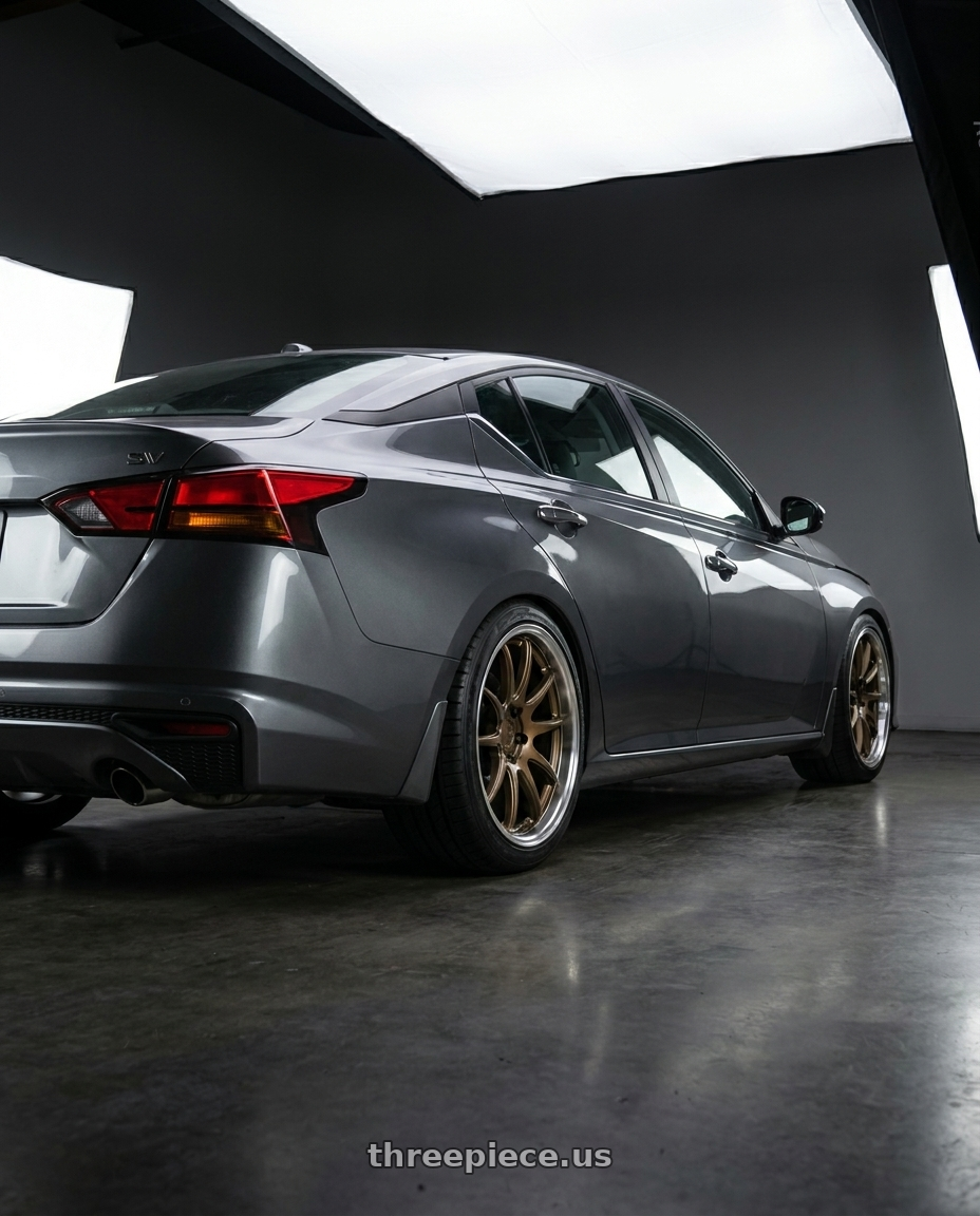2021 Nissan Altima SV with Aodhan DS02 5x114.3 18x8.5+35 Bronze w/Machined Lip wheels rear three quarter view square tires