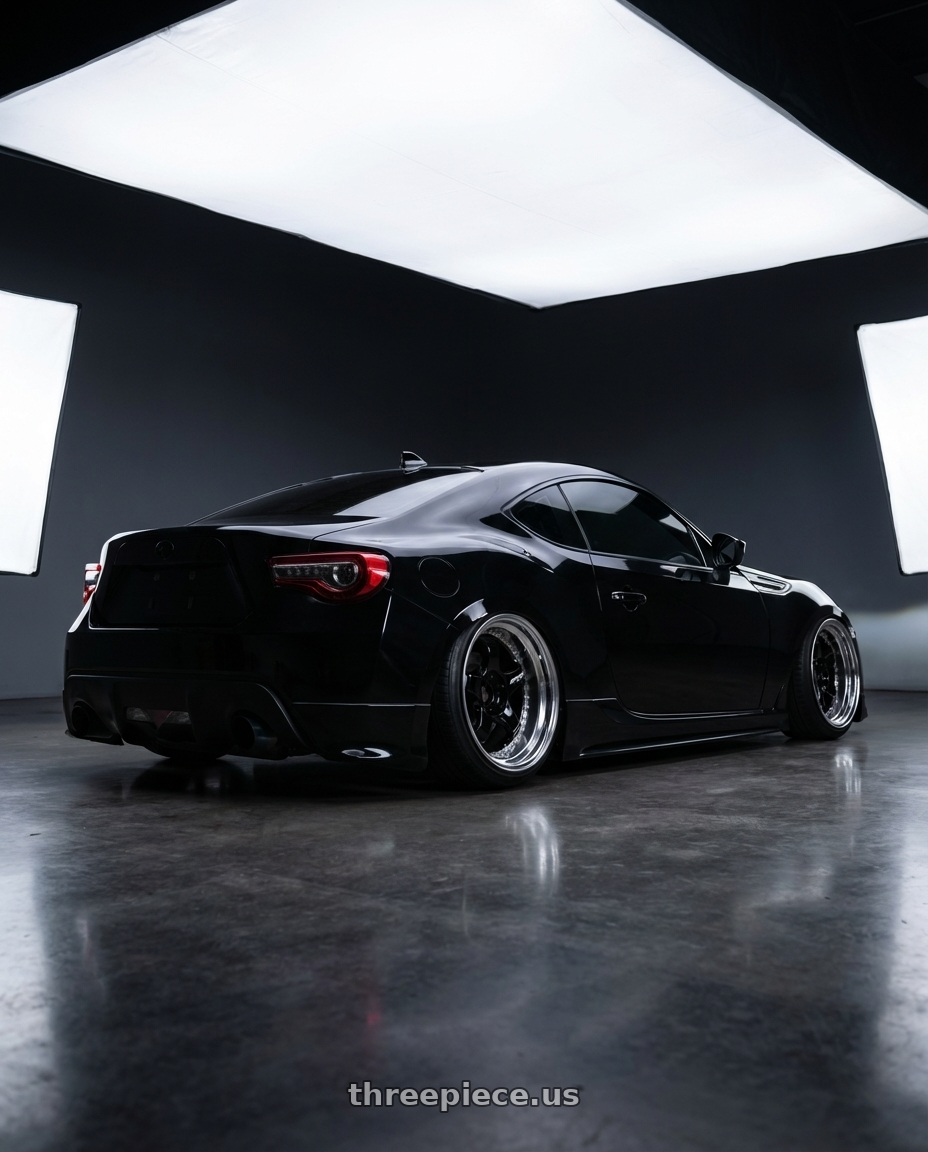 black 2013 scion frs with Work Meister S1 3P 5x100 18x9.5+3 A Disk Black wheels rear three quarter view extreme stretch tires