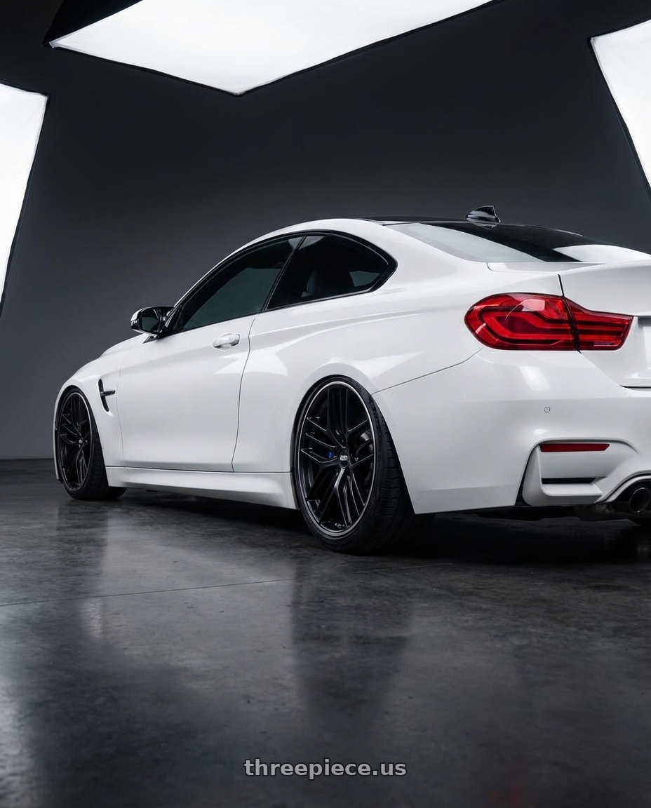 2018 BMW M4 F82 with BBS CC-R 5x120 19x10.0+38 Satin Black wheels rear three quarter view slight stretch tires