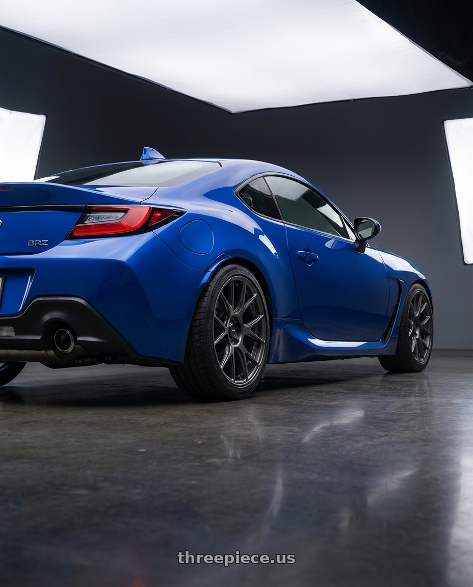 2024 Subaru BRZ with Konig Ampliform 5x114.3 18x8.5+35 Dark Metallic Graphite wheels rear three quarter view square tires