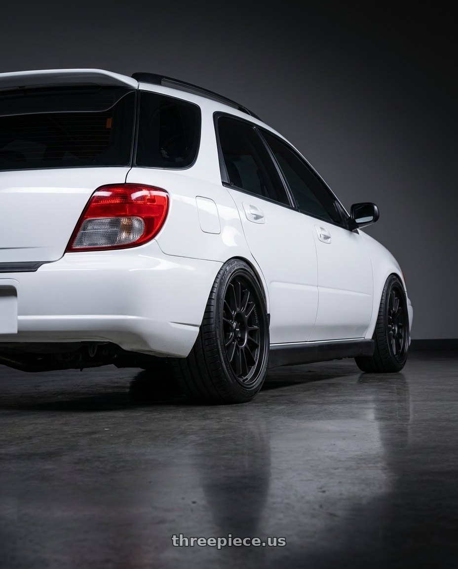 2002 Subaru wrx with Konig Hypergram 5x100 17x8+40 Matte Black wheels rear three quarter view slight stretch tires