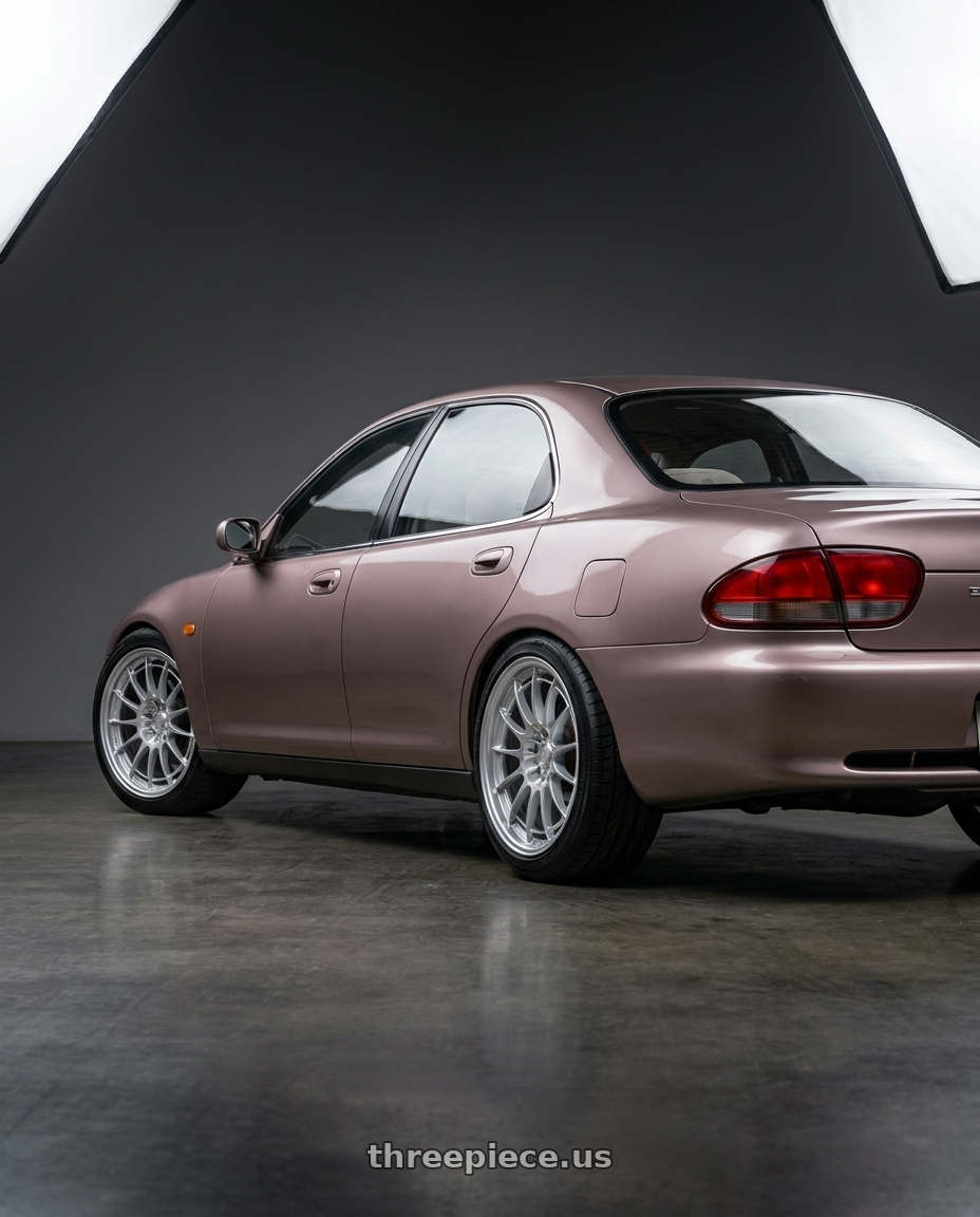 1990 eunos 500 with Enkei NT03+M 5x114.3 18x8.5+38 Silver wheels rear three quarter view square tires