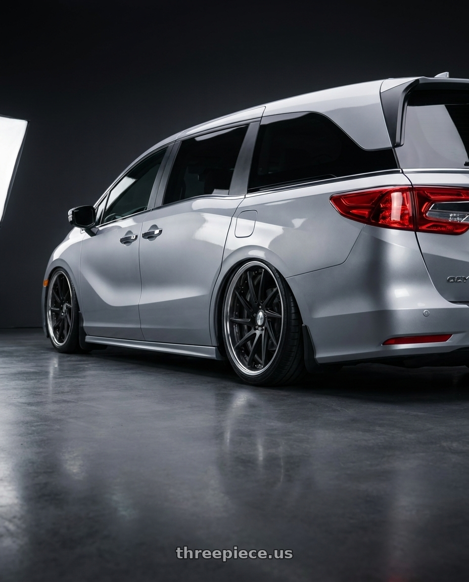 2024 Honda Odyssey with Work Gnosis Cvs 5x120 20x8+38 A Disk Matte Black wheels rear three quarter view square tires