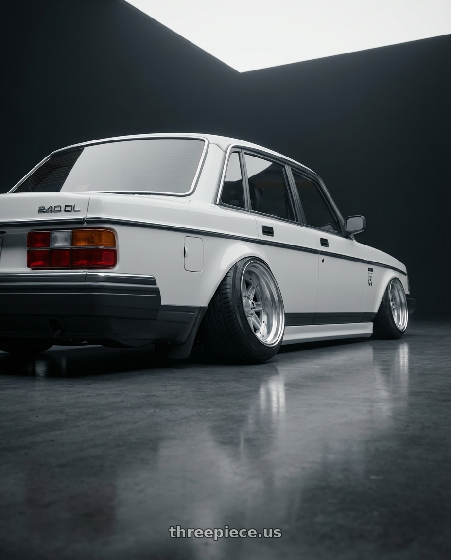 1987 Volvo 240DL Volvo white with Speed Star Mk-III 4x100 14X8+-12  Silver wheels rear three quarter view extreme stretch tires