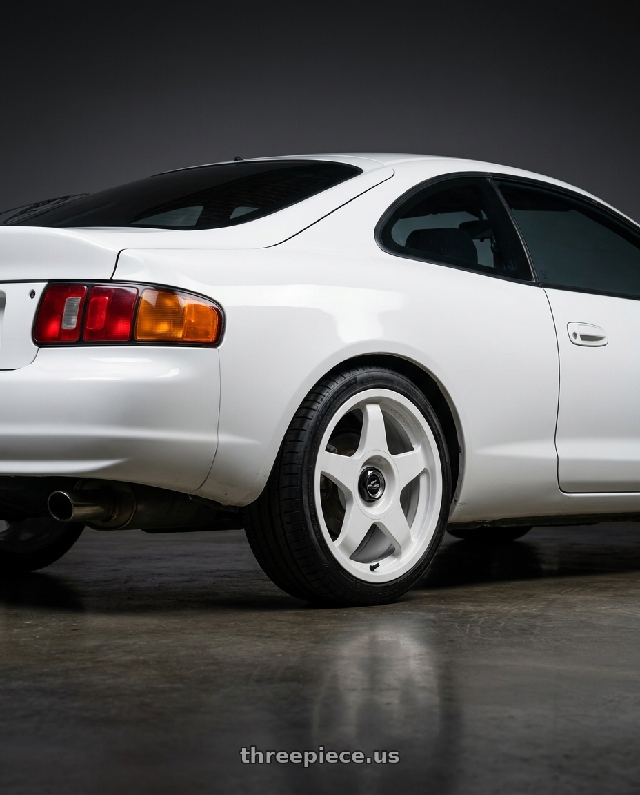 1997 Toyota Celica ST with fifteen52 CHICANE 5x100 / 5x112 17x7.5 +35 RALLY WHITE (GLOSS WHITE) wheels rear three quarter view square tires