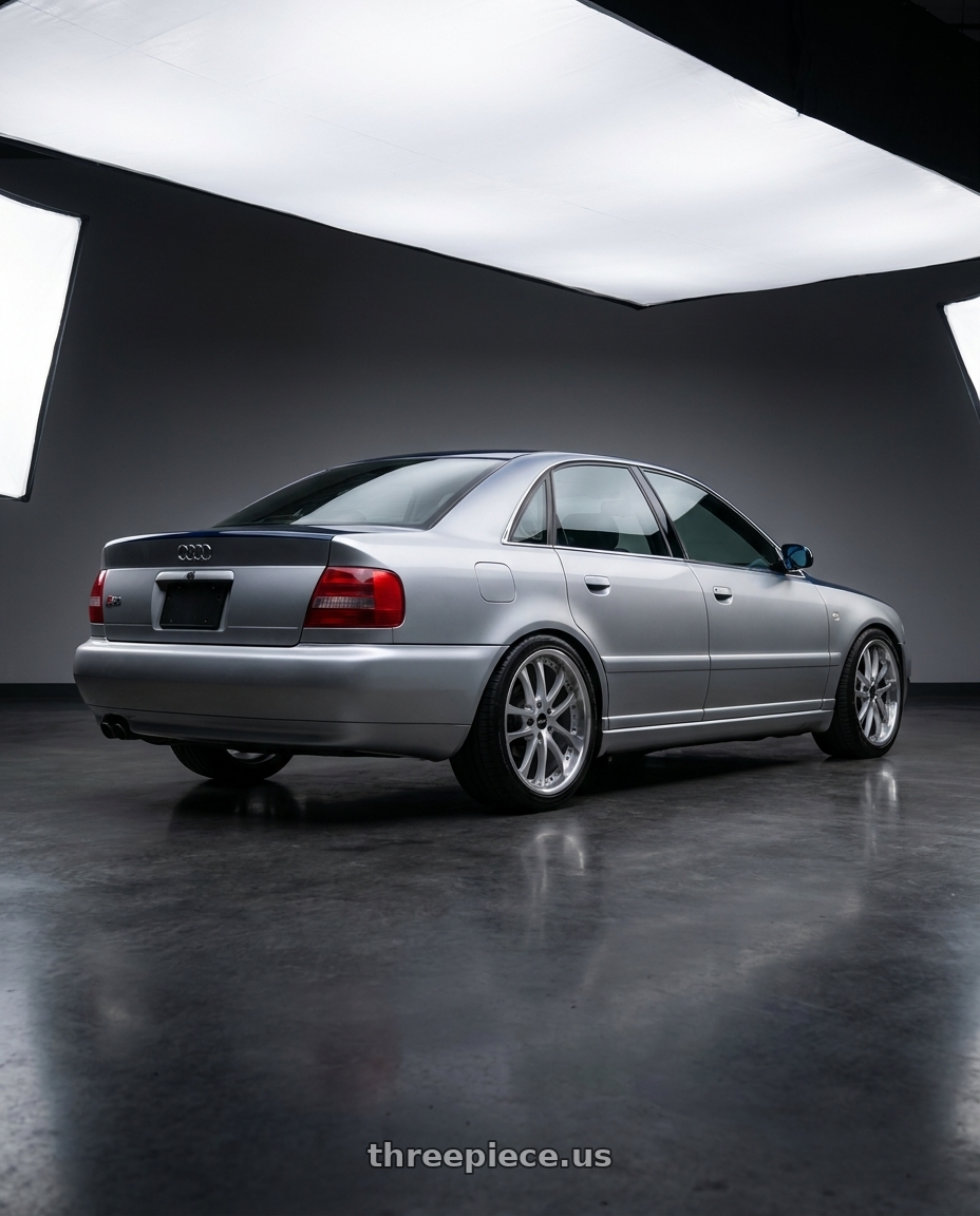 2001 Audi S4 with ARC AR5 5x114.3 18x9.5  +30 Silver Machine Face Lip Chrome Rivet wheels rear three quarter view square tires