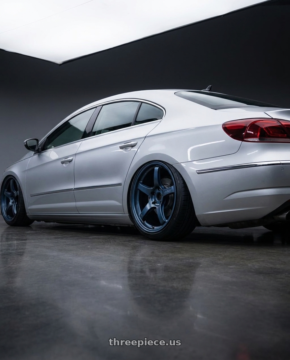 2015 Volkswagen CC with Gram Lights 57CR 5x112 19x10.5+22 Gunblue II wheels rear three quarter view slight stretch tires